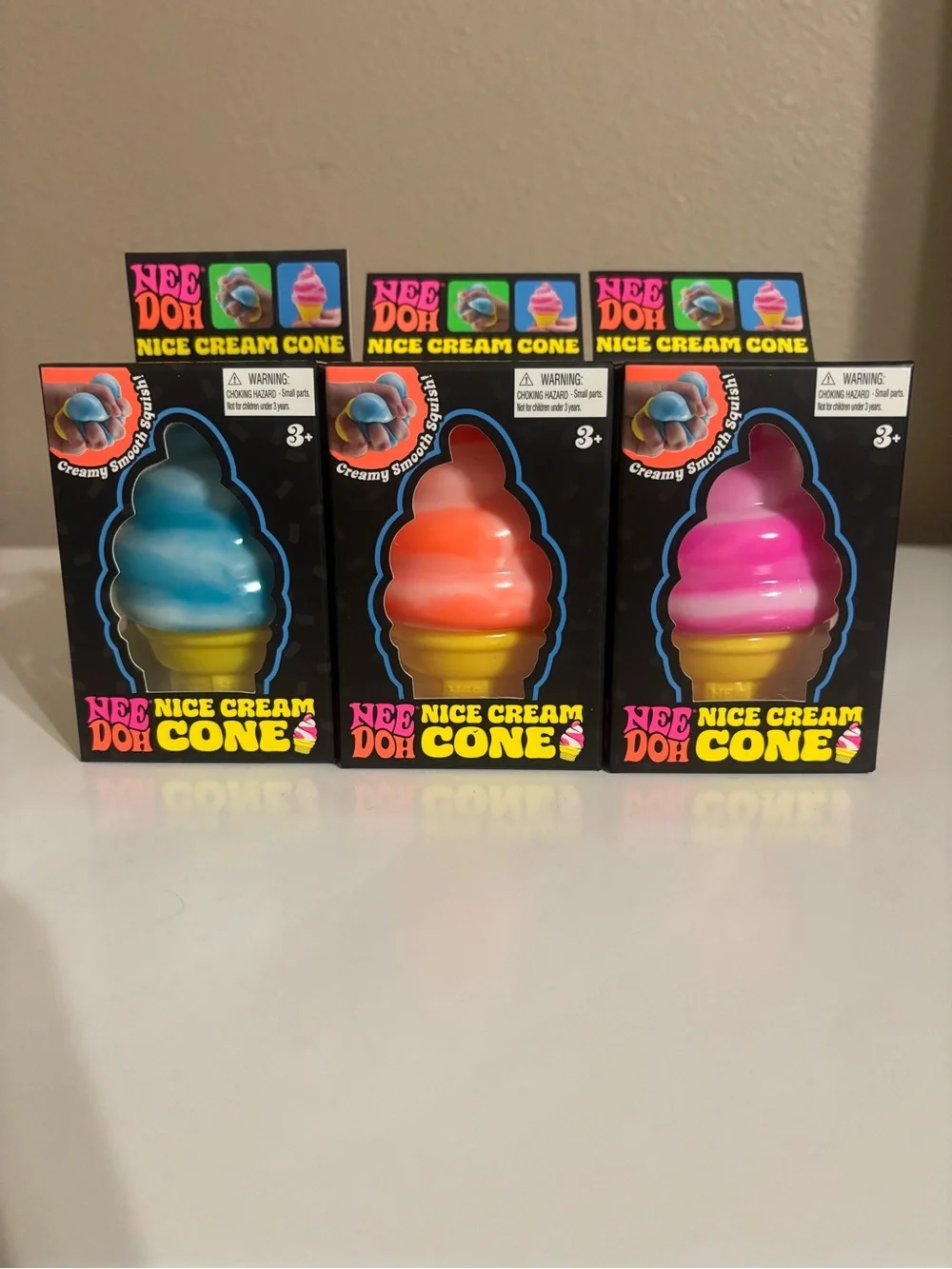 (3) NeeDoh Nice Cream Cones Squishy Toy - Blue, Orange, Pink (Set)